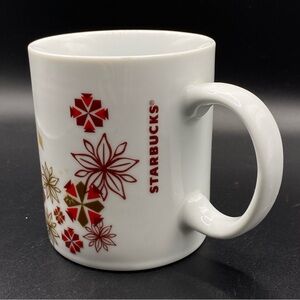 STARBUCKS 2013 Holiday Coffee Mug 12oz Floral Snowflakes White & Red